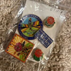 Rose parade pins and Berkeley California pins